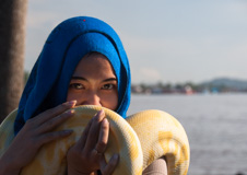 Girl with yellow snake